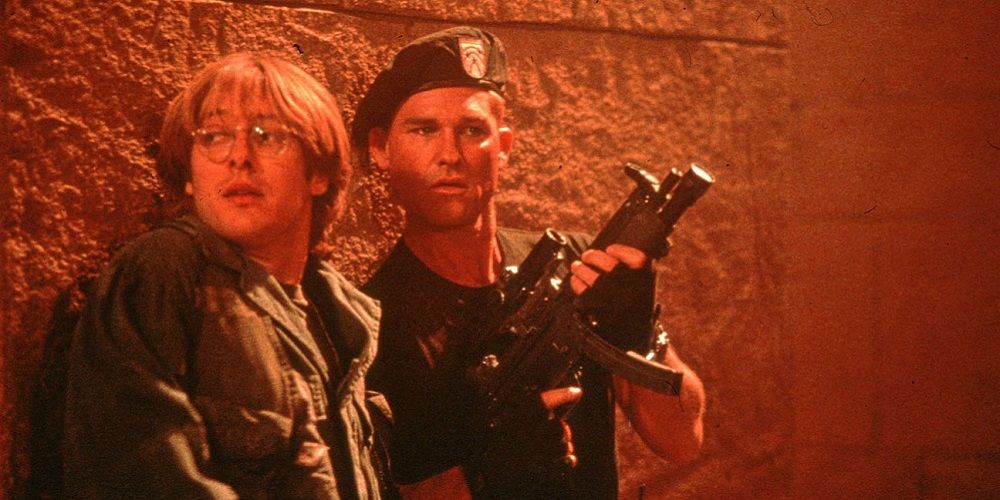 Jack and Daniel take cover and are armed to the teeth in Stargate