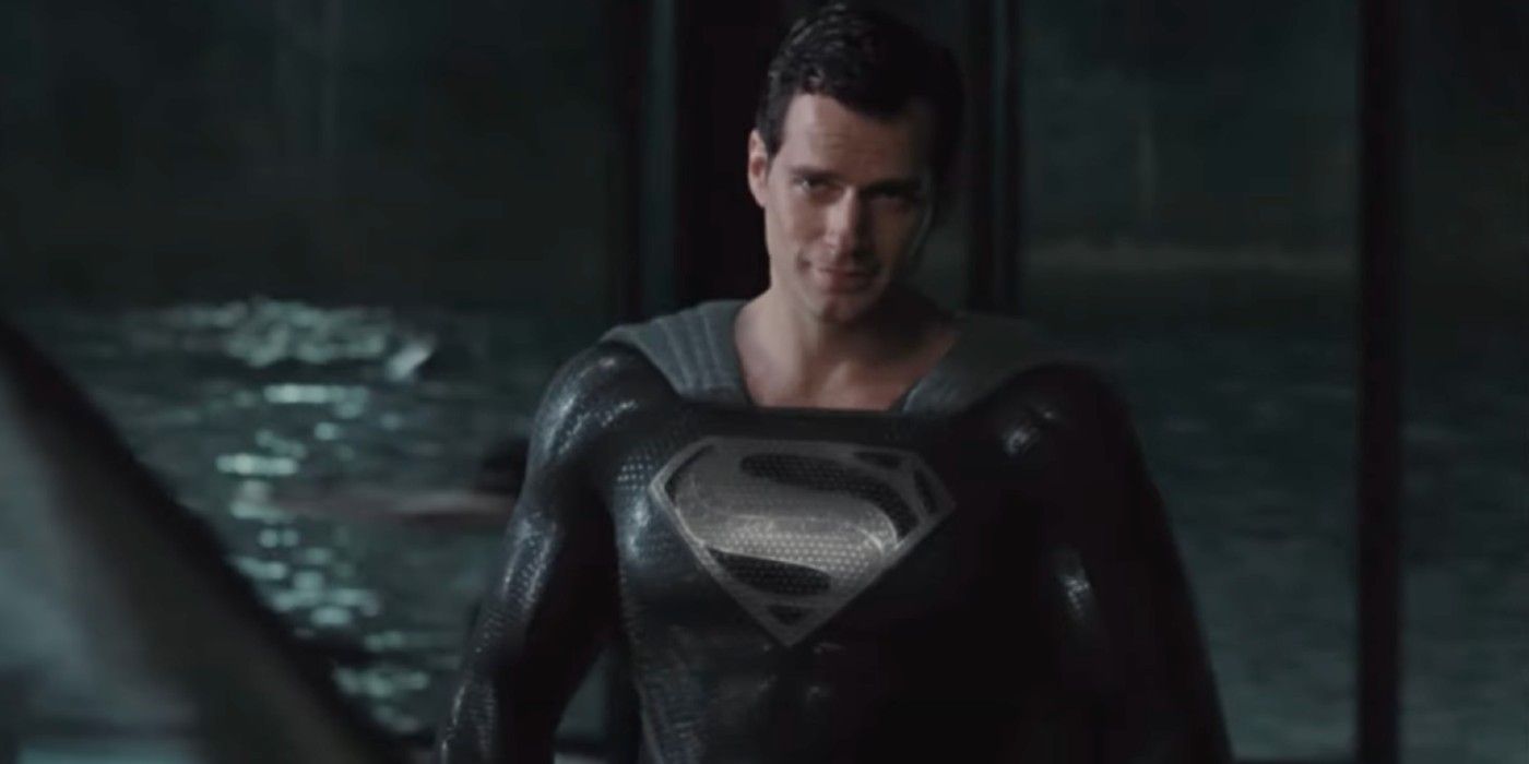 Superman smiles while wearing the black suit