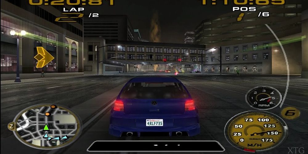 A VW drives through the streets of Detroit at night in Midnight Club III DUB Edition