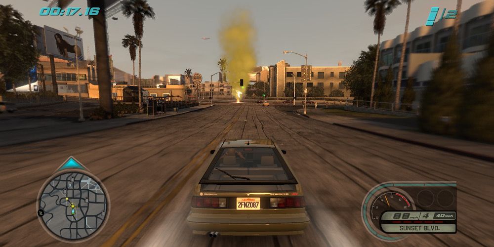 A racer speeds to a yellow checkpoint in the distance on an open LA street in Midnight Club: Los Angeles