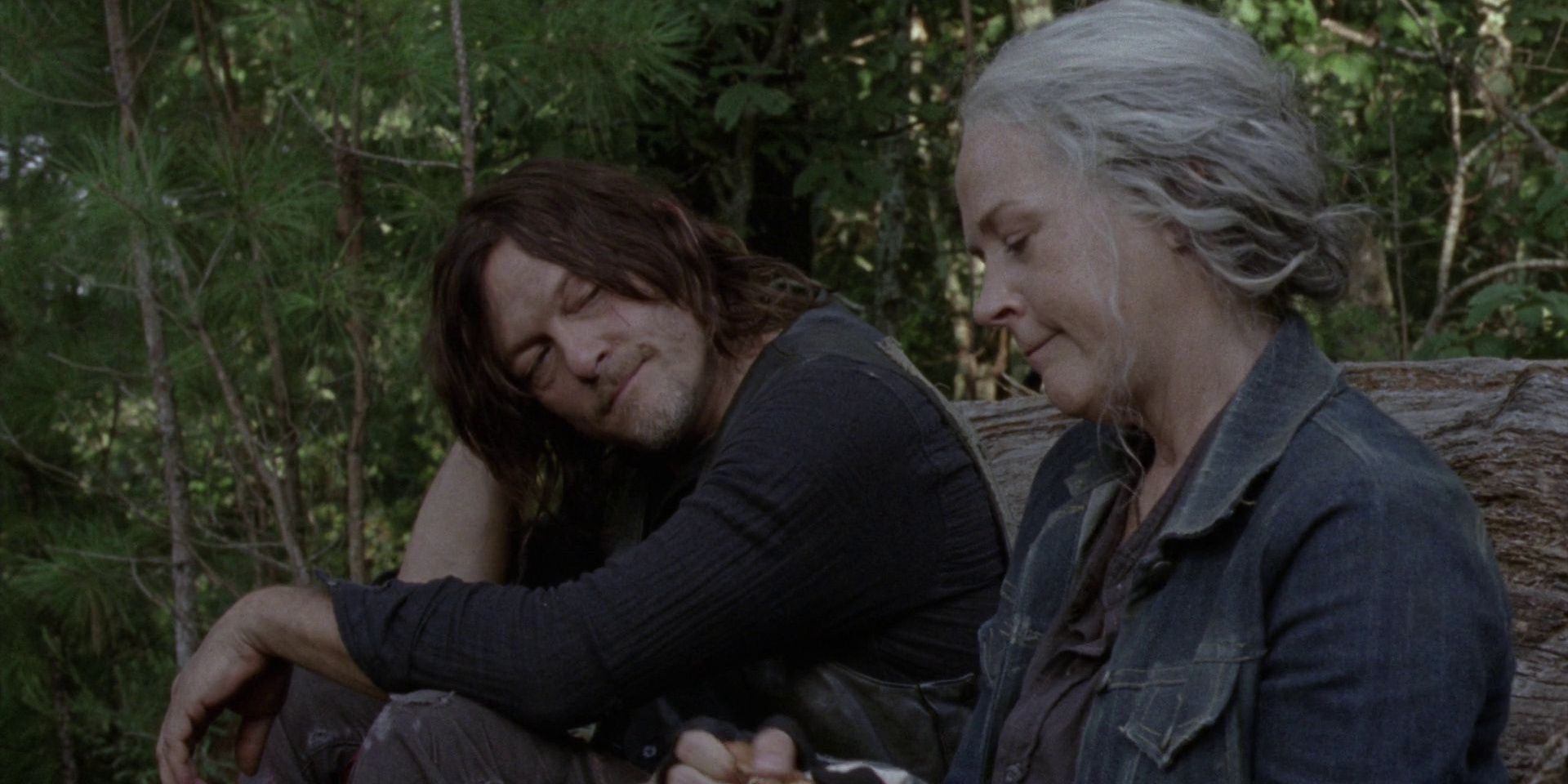 Daryl sits in the woods with Carol and looks at her lovingly in Season 10 Episode 6 of The Walking Dead