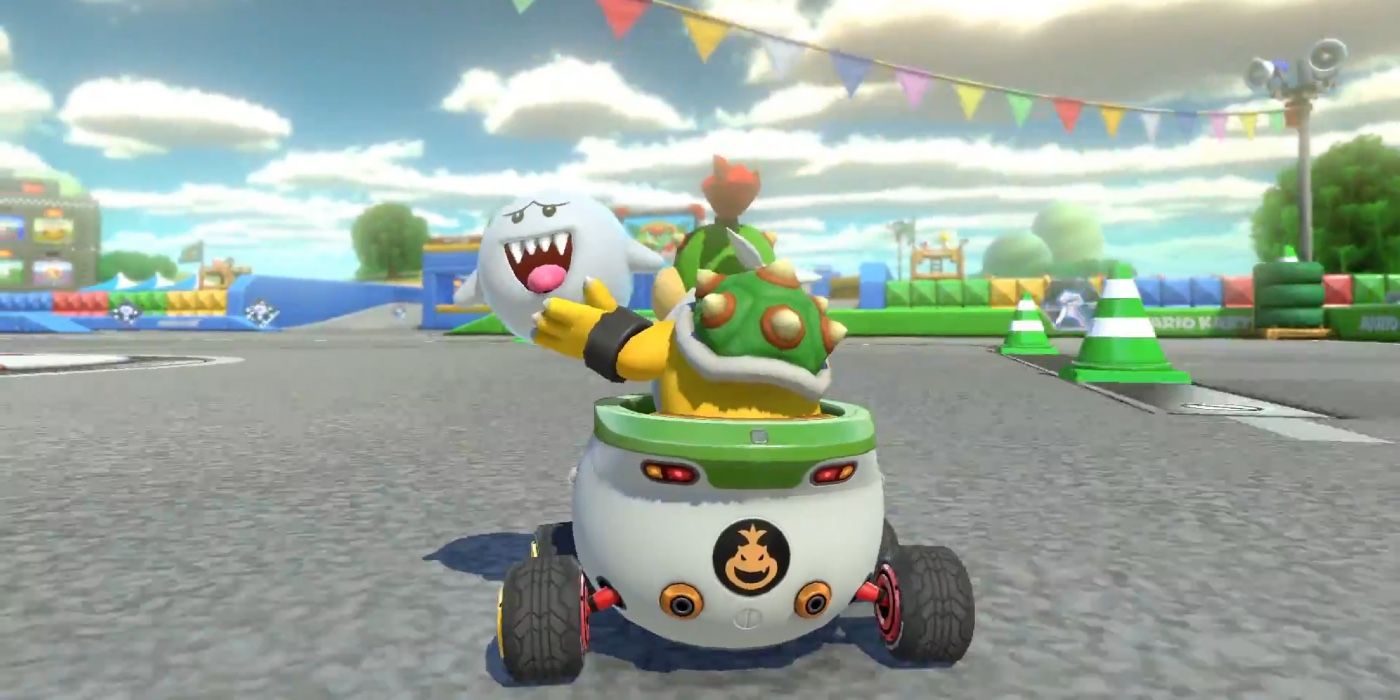 Bowser Jr. holding a Boo item in Mario Kart 8.