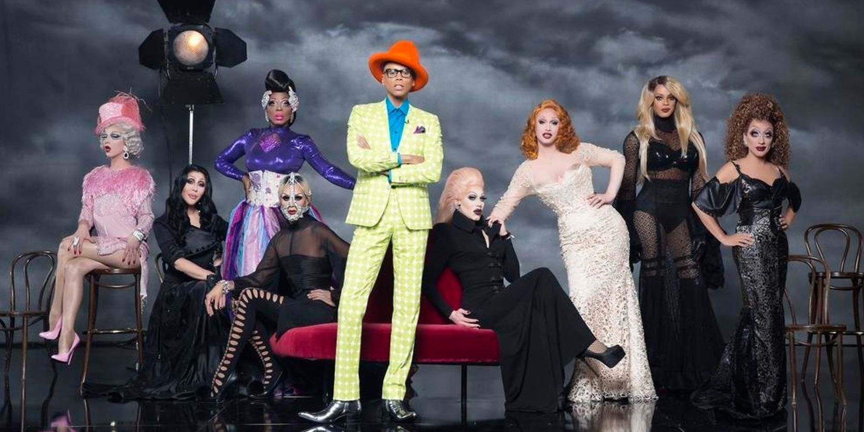 RuPaul standing with winning queens of season 1 through 7