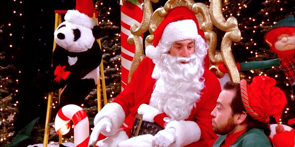 Kramer dressed as Santa at a mall