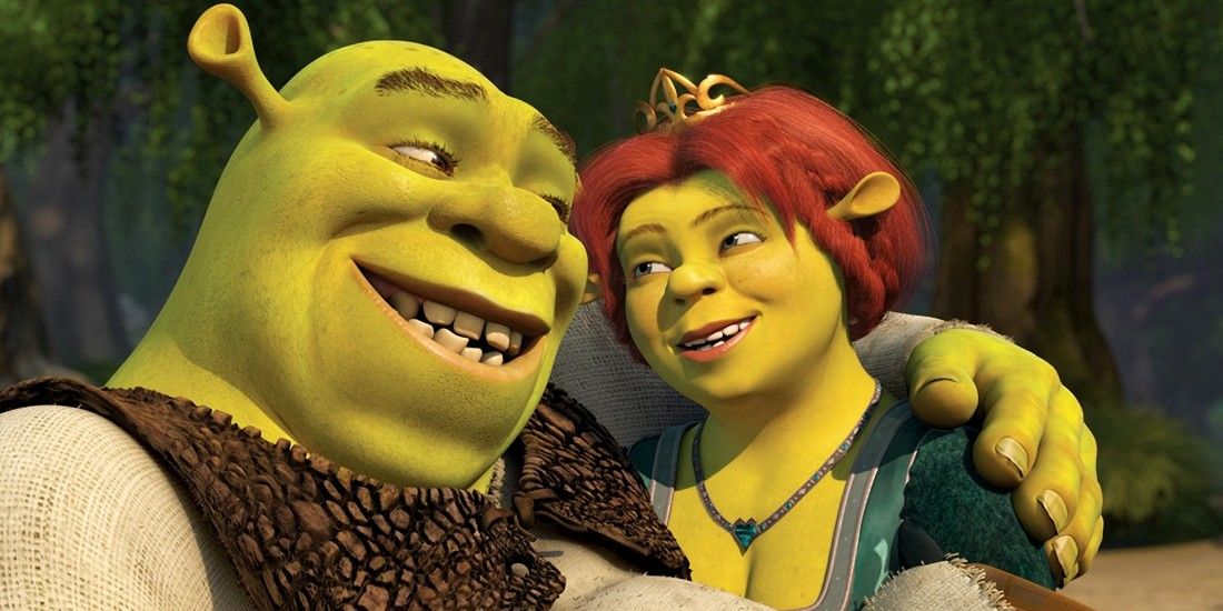 Fiona and Shrek hugging and looking into each others' eyes.