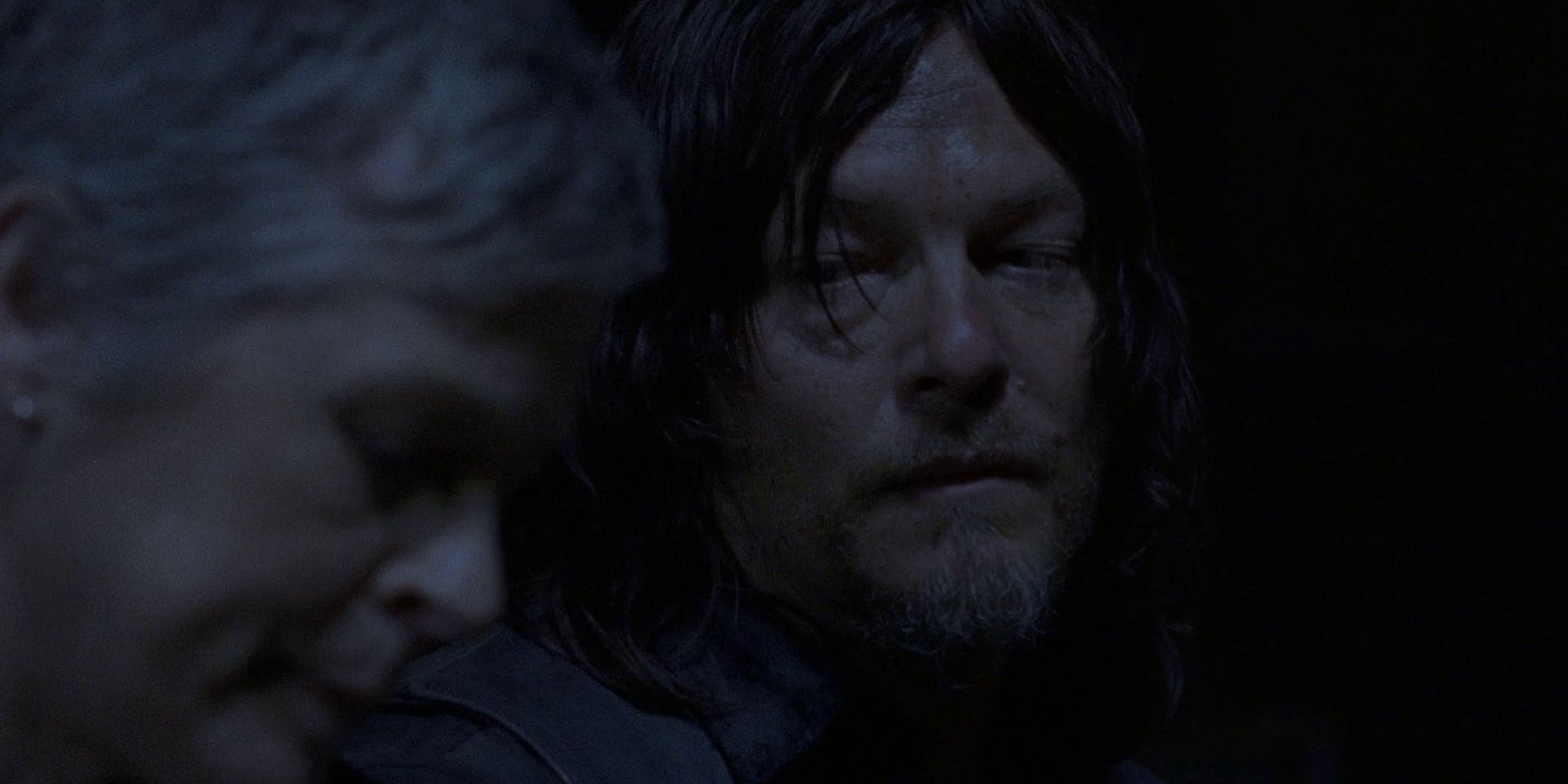 Daryl and Carol talk in the dark in The Walking Dead