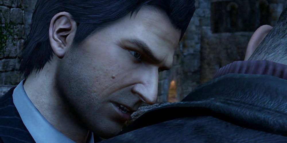 Talbot whispers in Drake's ear in Uncharted 3: Drake's Deception