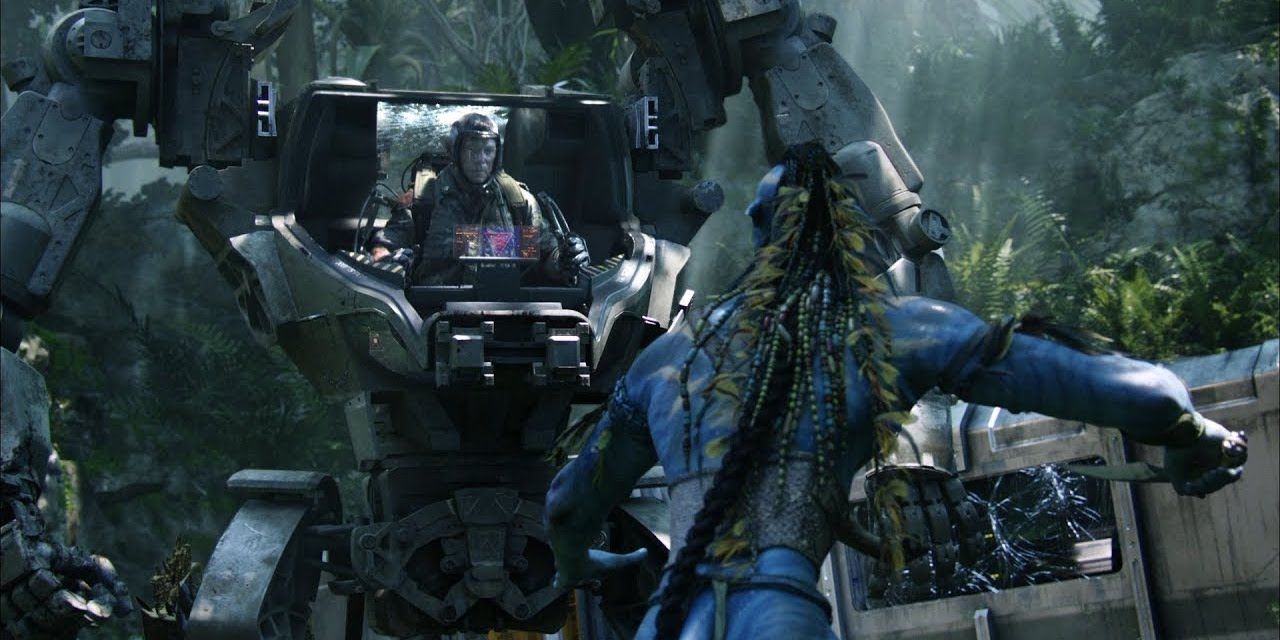 A Na'avi faces off against a mech suit in Avatar (2009)