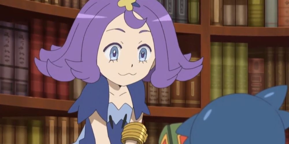 Acerola smiling at the library in the Pokémon Sun &amp; Moon anime