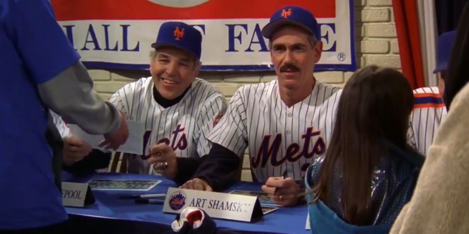 Art Shamsky sits with the New York Mets team at the Baseball Hall of Fame in Everybody Loves Raymond
