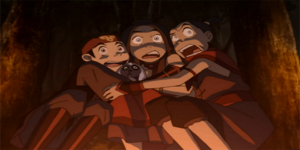 Airbender characters clutching each other with scared looks on their faces
