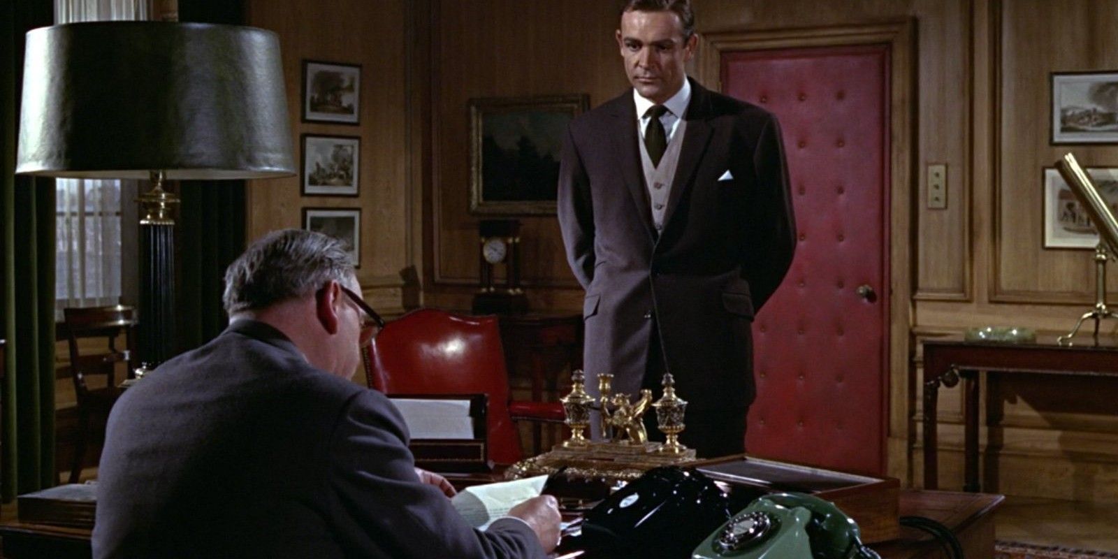 Bernard Lee as M and Sean Connery as James Bond in Goldfinger