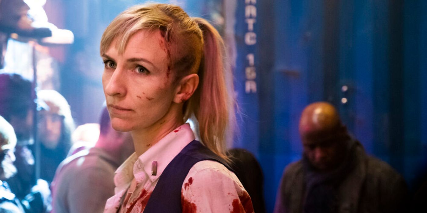 Bess Till is covered in blood and looks bemused about it in Snowpiercer.