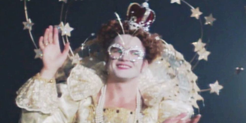 Elton John dressed as Queen Elizabeth