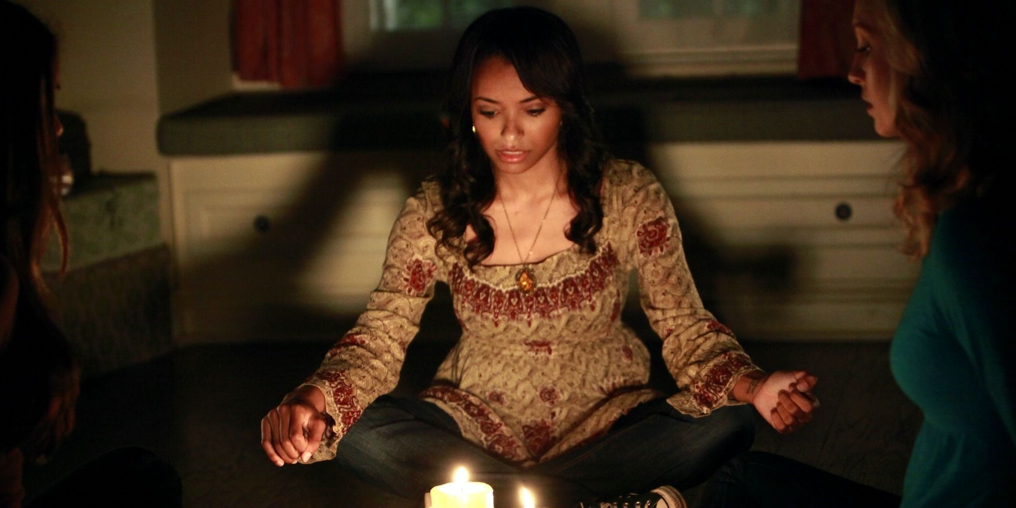 Bonnie Bennett doing a spell in The Vampire Diaries.