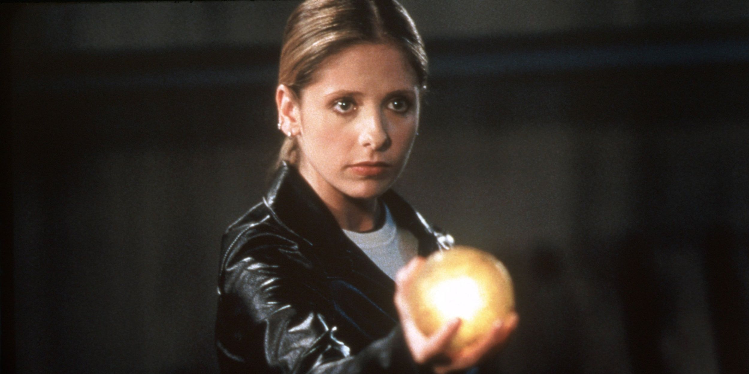 Buffy Summers holding an orb