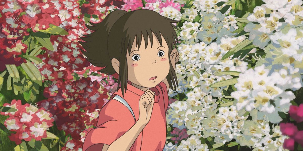 Chihiro surrounded by flowers in Spirited Away.