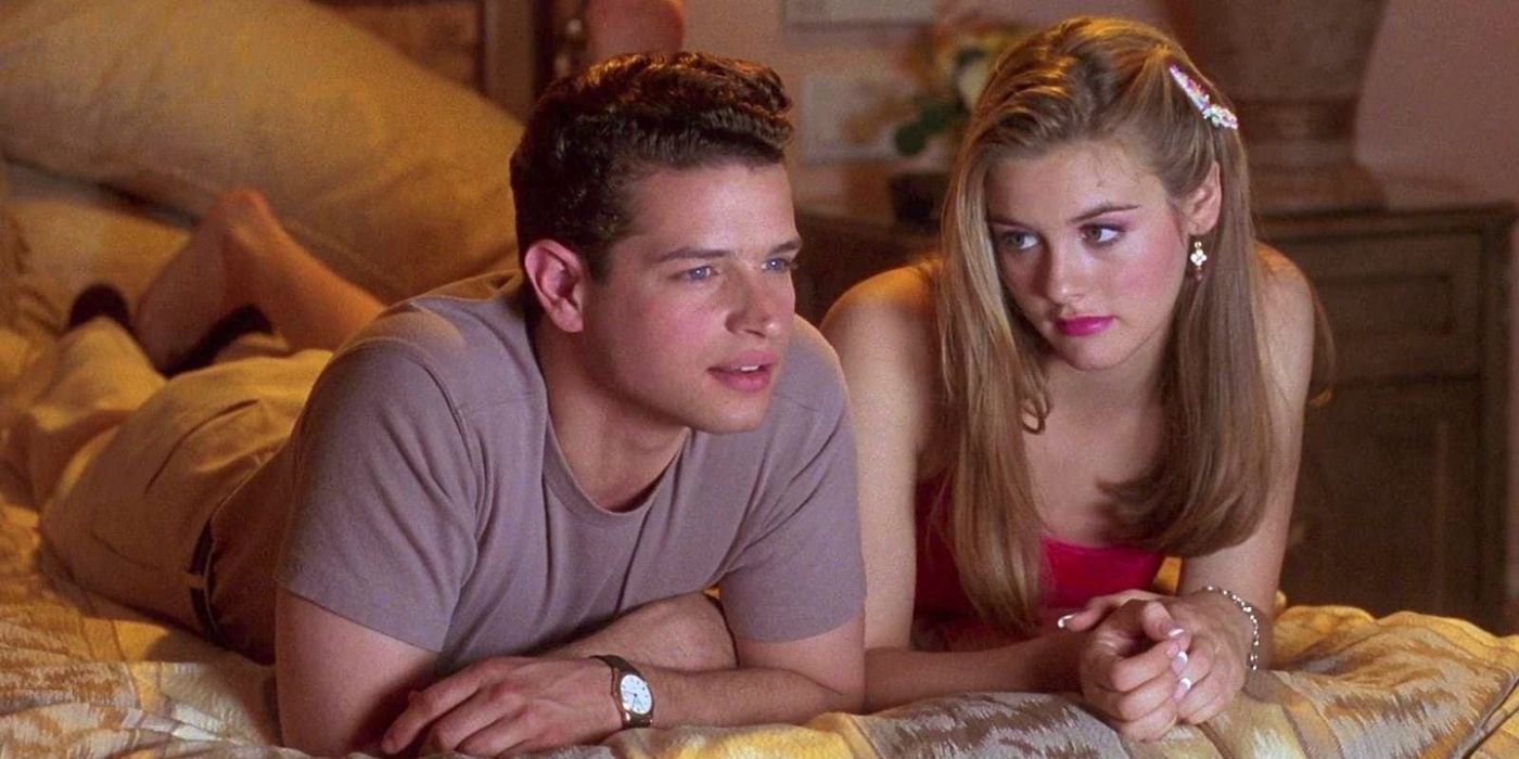 Christian and Cher lying on bed together in Clueless