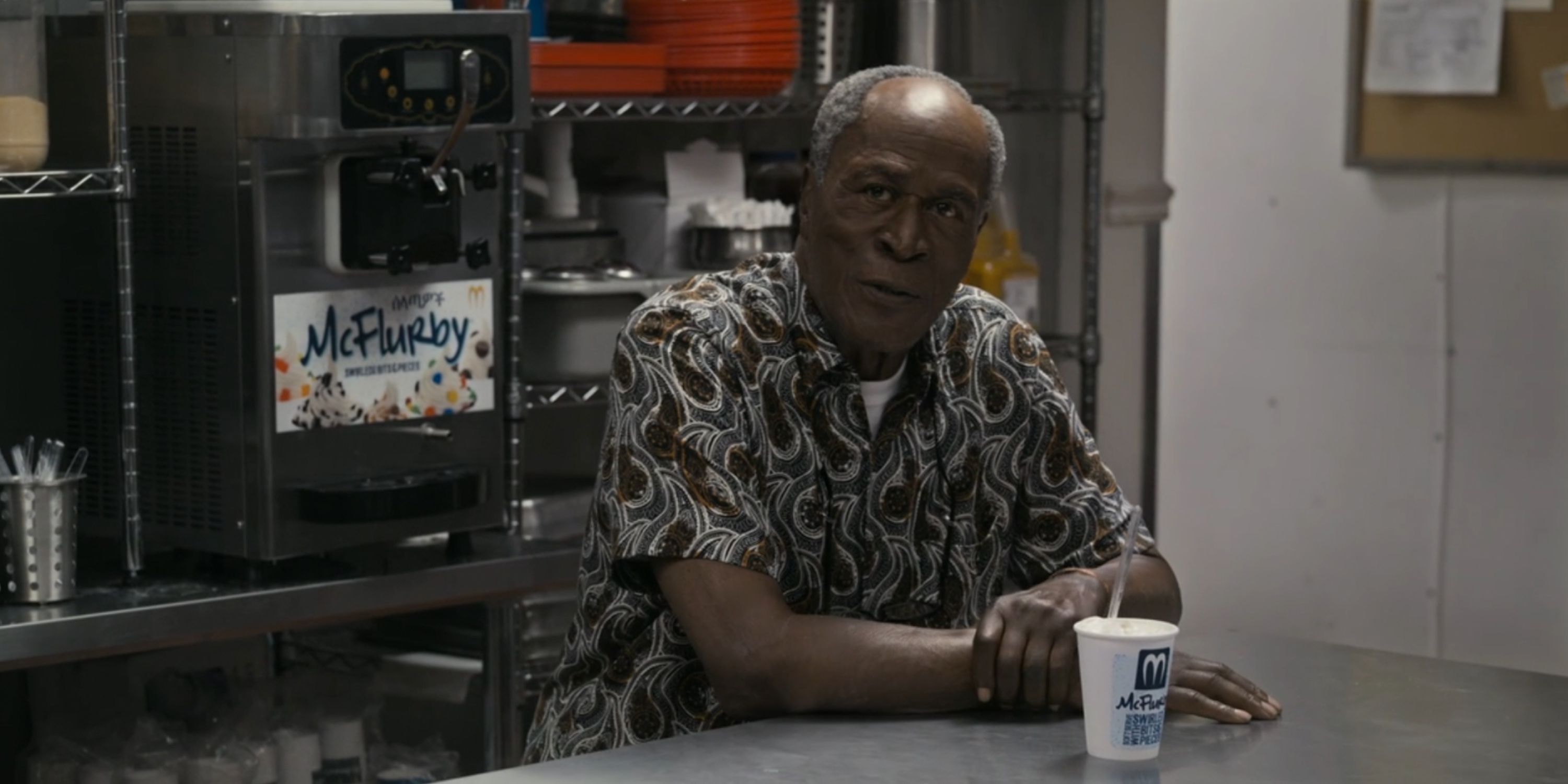 John Amos as Cleo McDowell eating ice cream in Coming 2 America