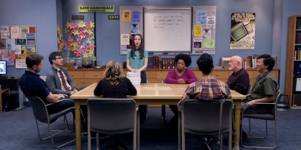 Community Greendale College Study Group Sitting At A Table