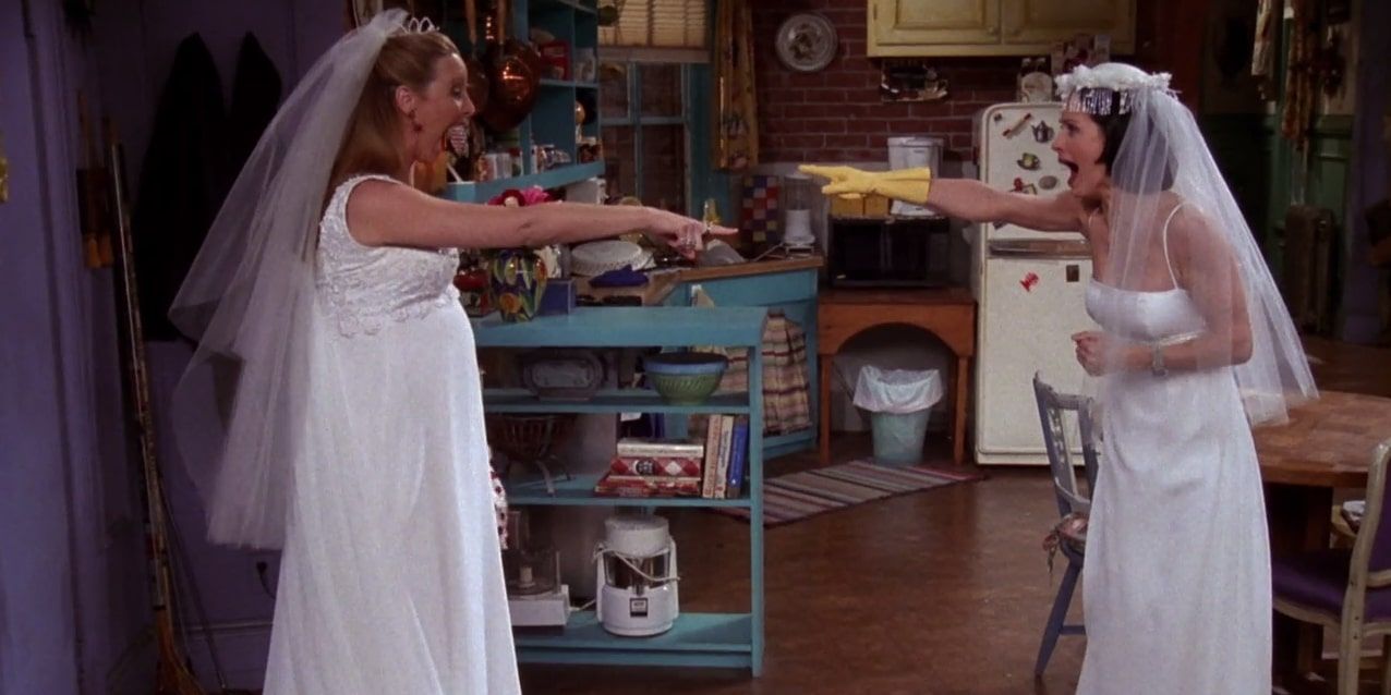 Monica and Phoebe both wearing gowns in Friends episode The Wedding Dresses