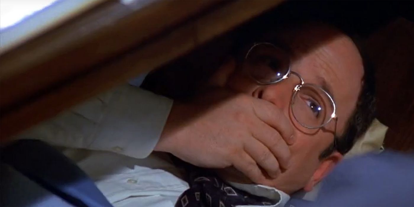 George under his desk in Seinfeld