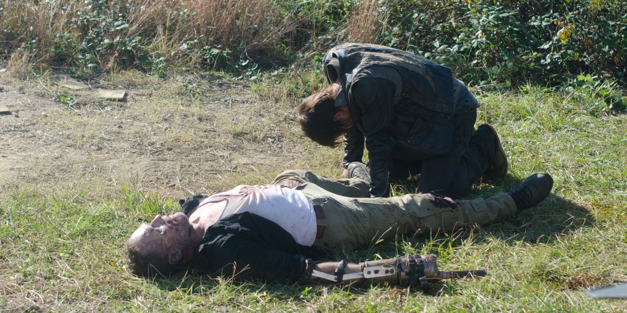 Daryl cries over Merle's body on The Walking Dead