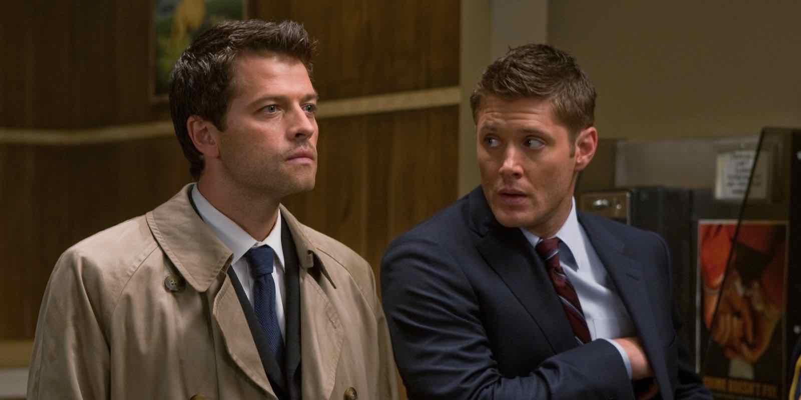 Dean And Castiel sitting side by side