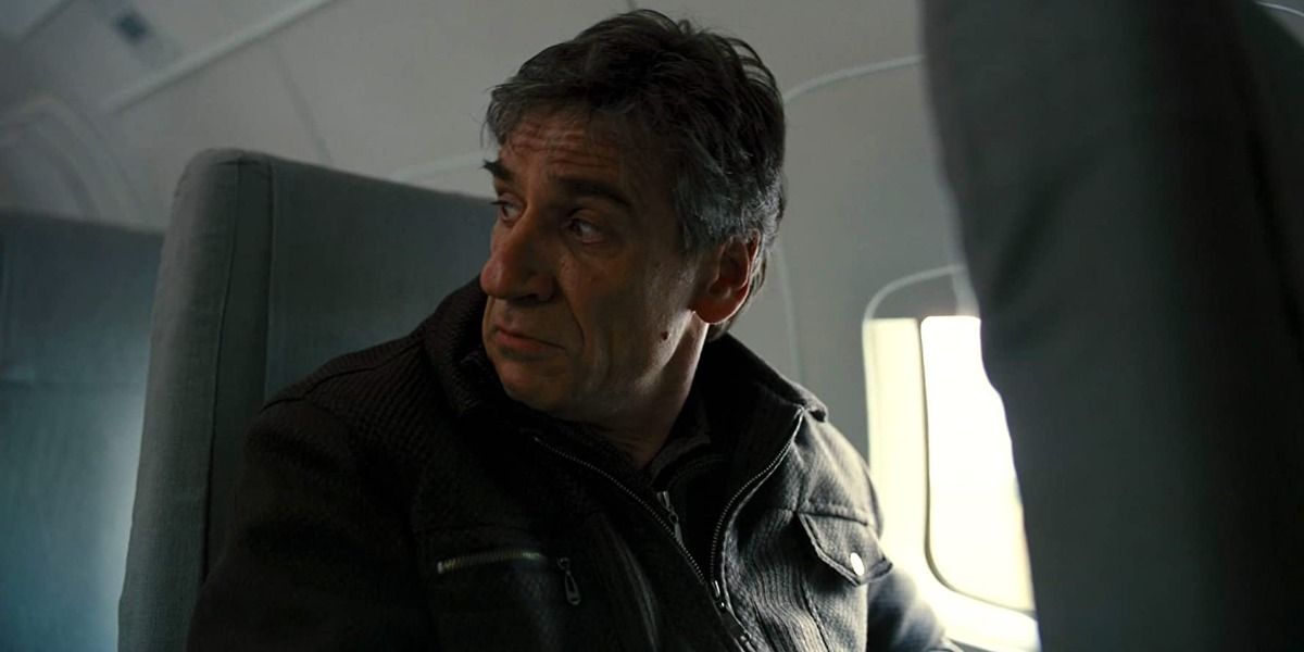 Dr Leonid Pavel sits on a plane in the opening scene of The Dark Knight Rises