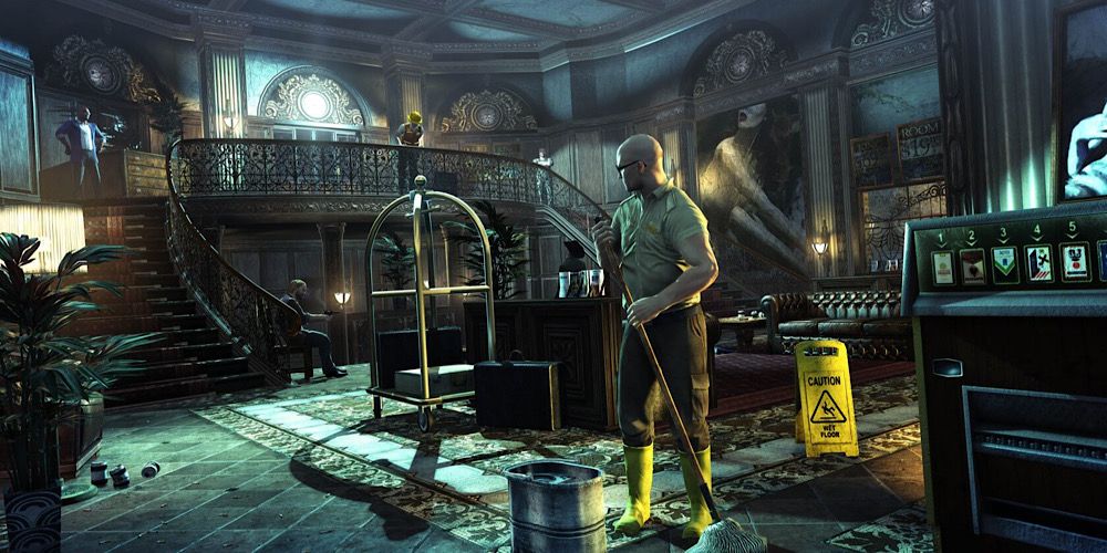 Agent 47 disguised as a janitor in a dark hotel lobby in Hitman Absolution