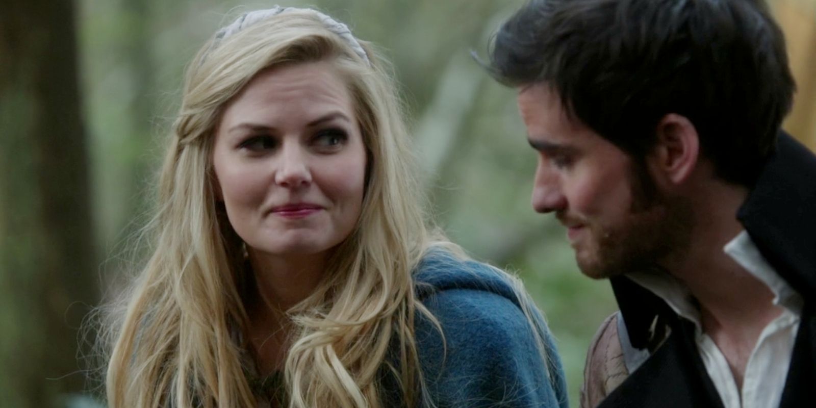 Emma Swan with long hair flowing, teal cloak, and white dress in Once Upon a Time