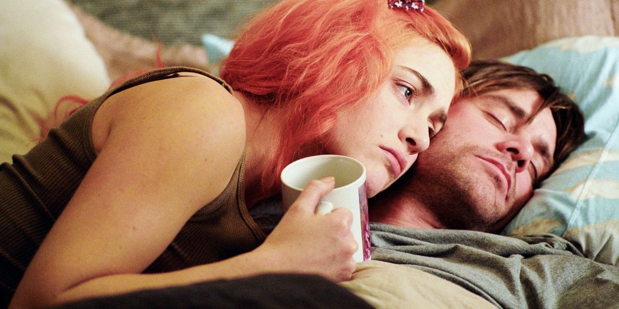Jim Carrey and Kate Winslet lying in bed in Eternal Sunshine of the Spotless Mind