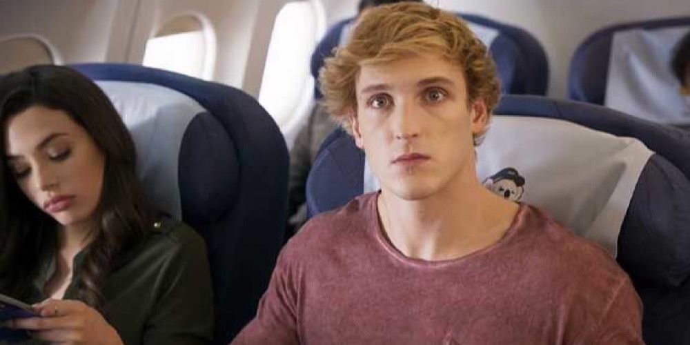 Logan Paul sits in an airplane playing himself in Airplane Mode
