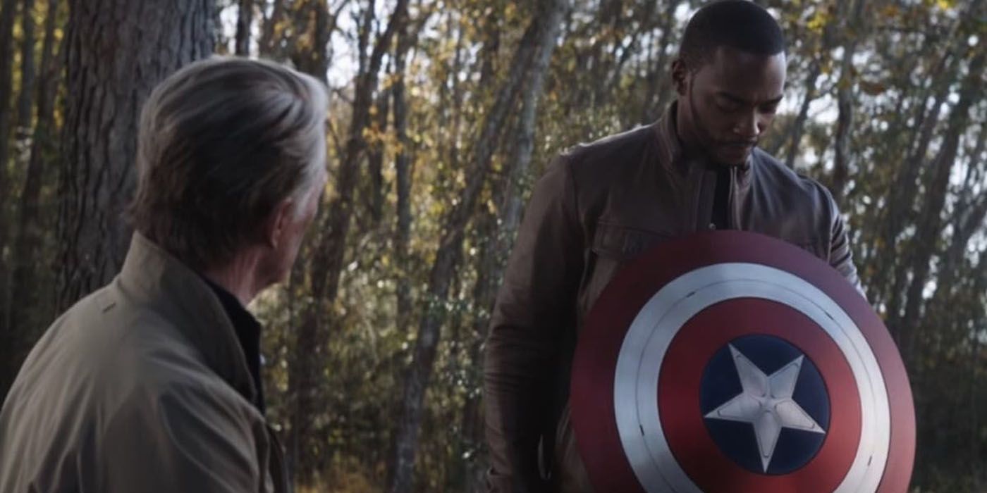 Captain America gives Falcon his shield.