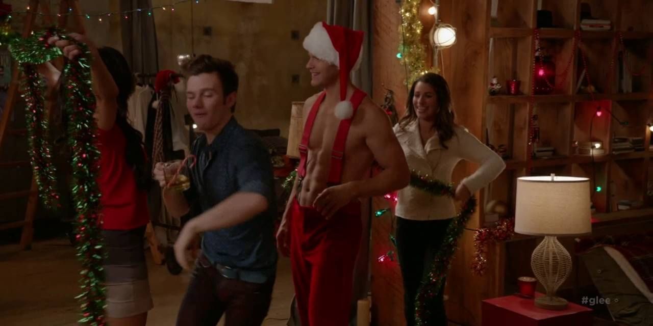 Rachel, Santana, and Kurt dance around Cody.
