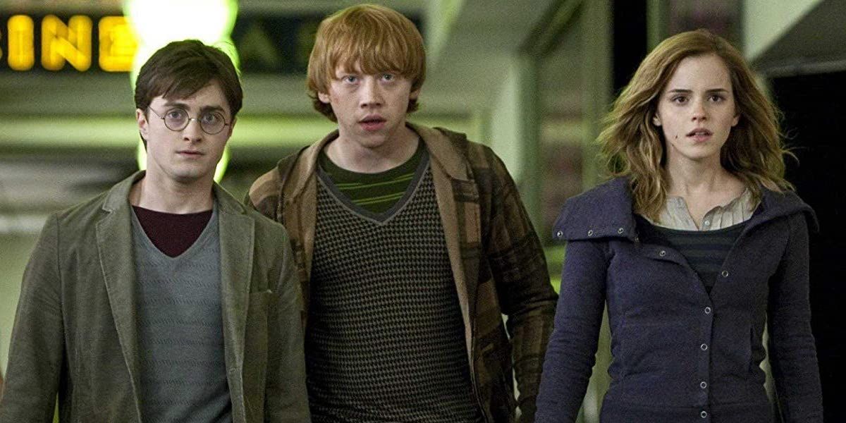 Harry. Ron, and Hermione walk in the streets in Deathly Hallows Part 1