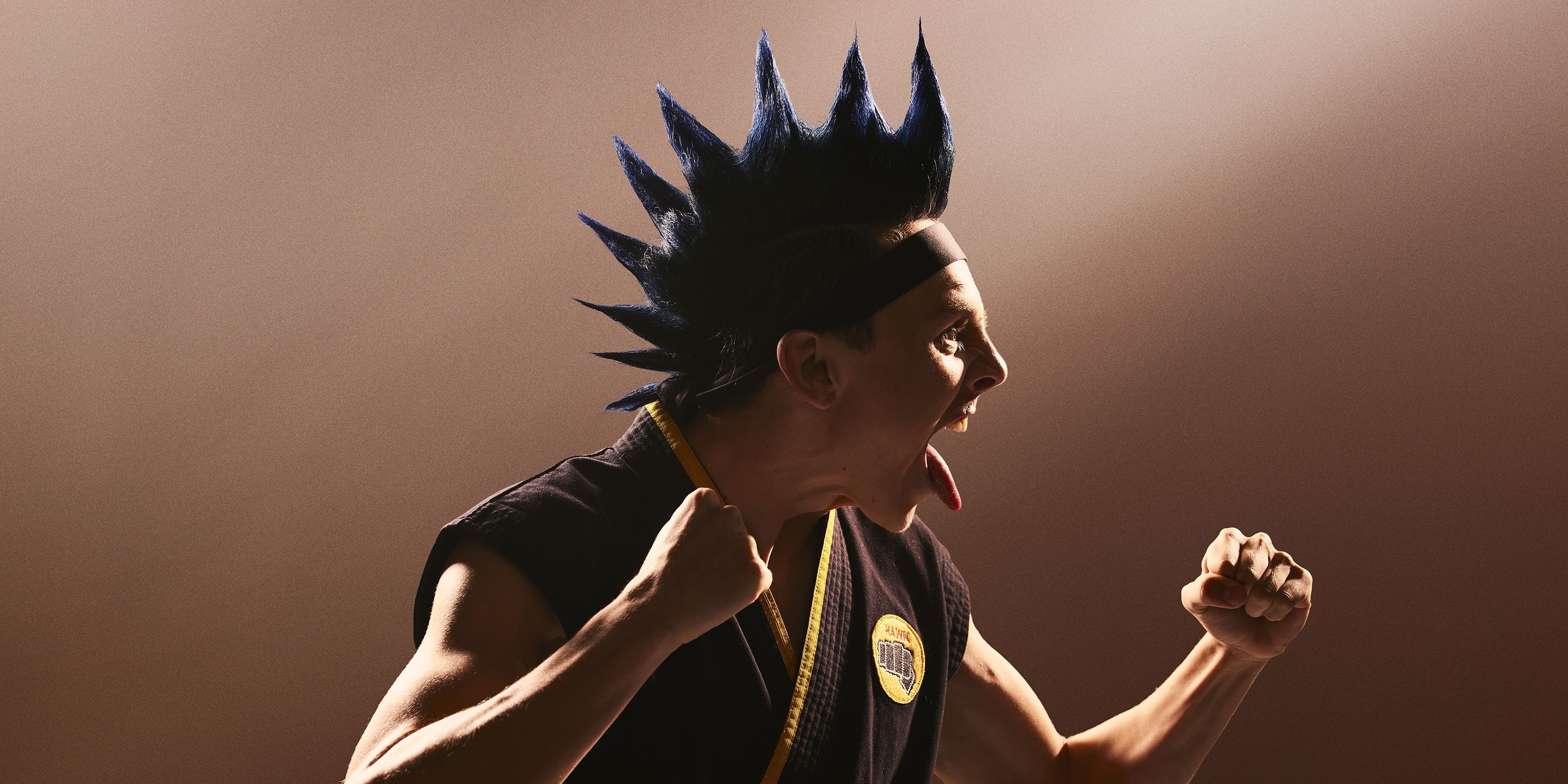 Hawk in a fighting stance in a promotional image from Cobra Kai