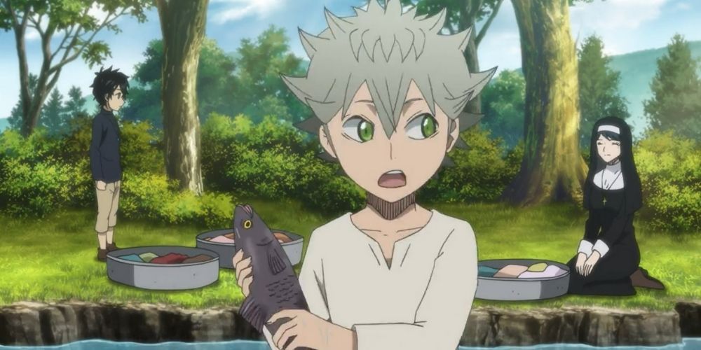 Asta as a child holding a fish in Black Clover