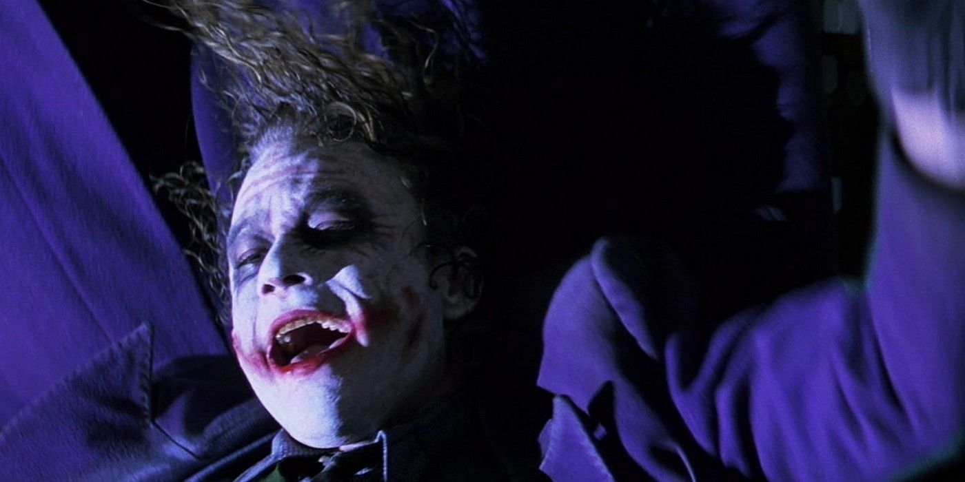 Joker hanging upside down at the end of Dark Knight