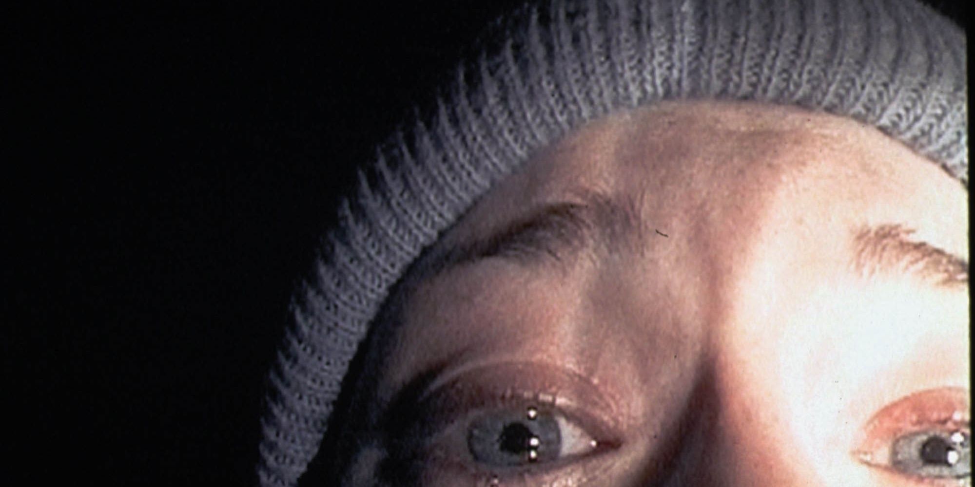 Closeup of a scared Heather in The Blair Witch Project