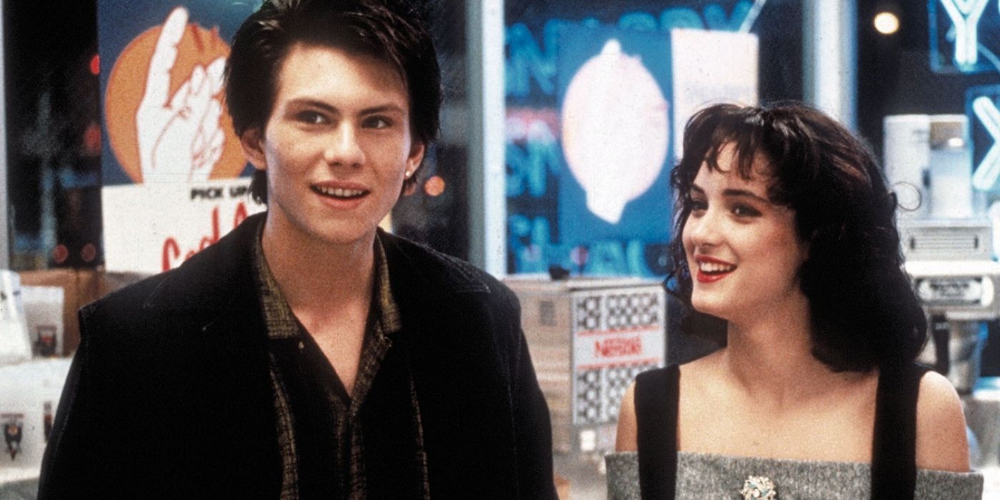 J.D. and Veronica smiling and standing in store in Heathers