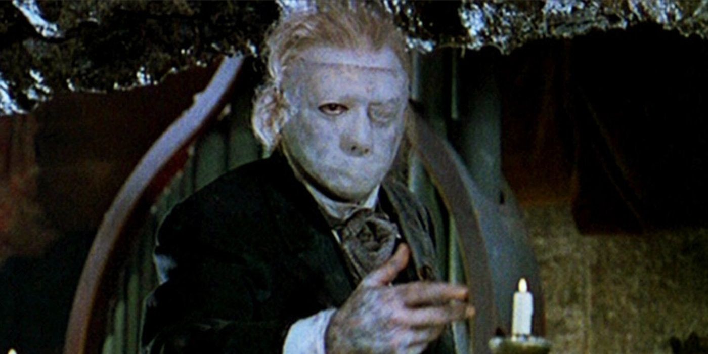 Herbert Lom as The Phantom holding a candle in Phantom of the Opera 1962