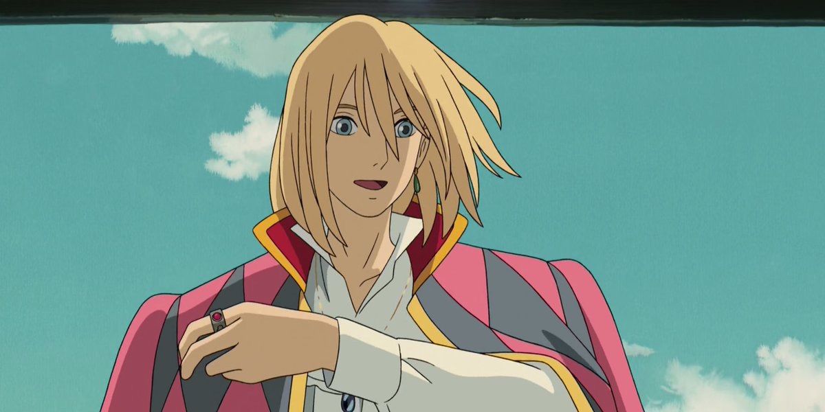 Close up of Howl with red and black jacket and sky backdrop in Sky&rsquo;s Moving Castle
