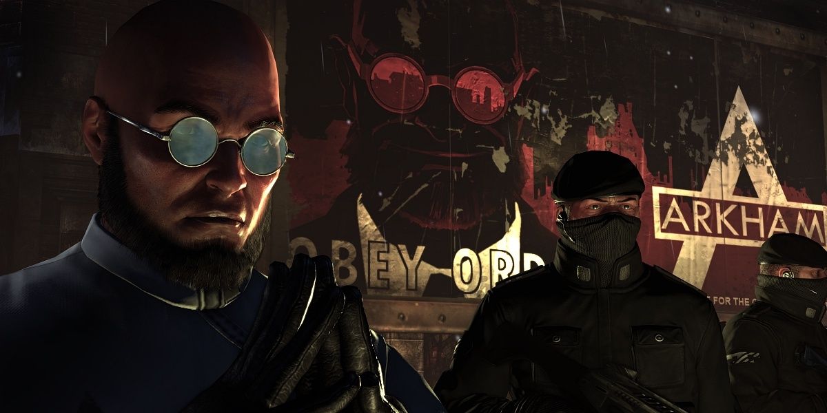 Hugo Strange stands in front of a billboard of himself with two armoured guards