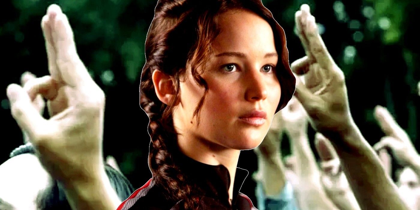A composite image features Katniss in front of three-finger saluting hands in the Hunger Games franchise