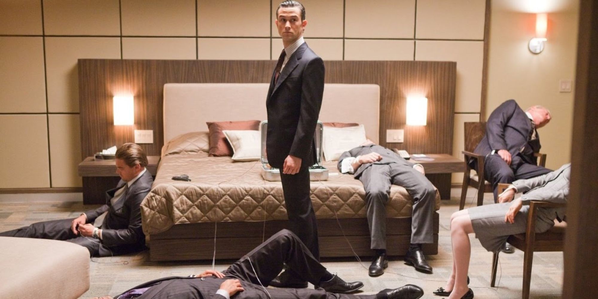 An image of Joseph Gordon-Levitt standing in a hotel room in Inception