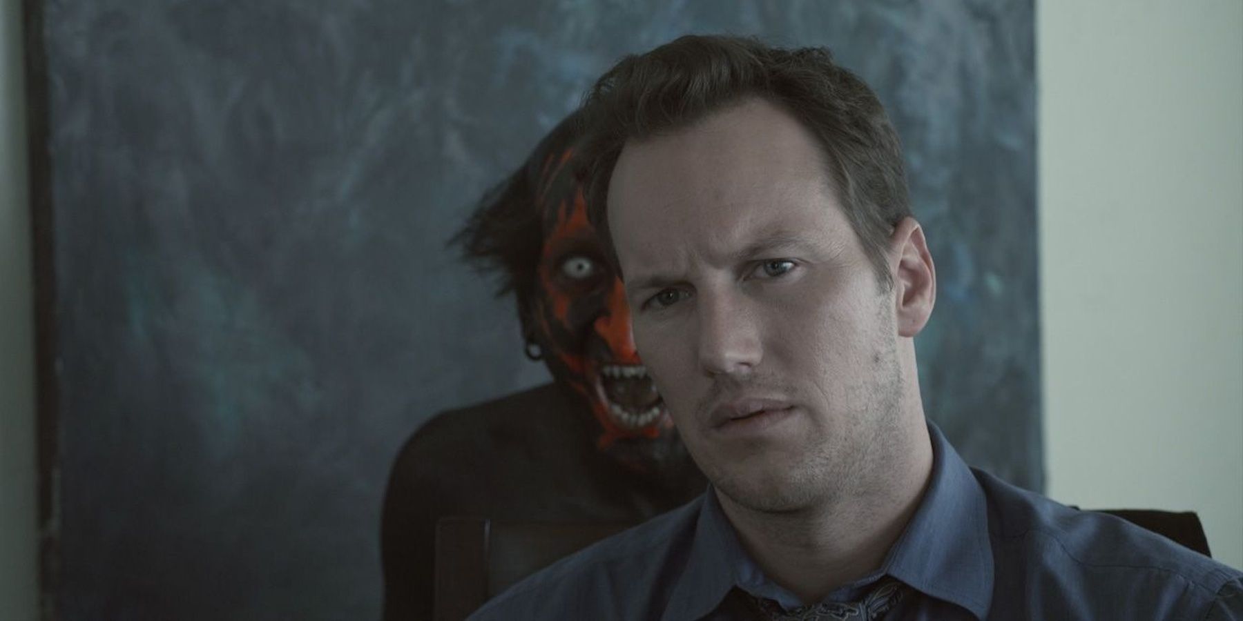 Patrick Wilson with painting behind him