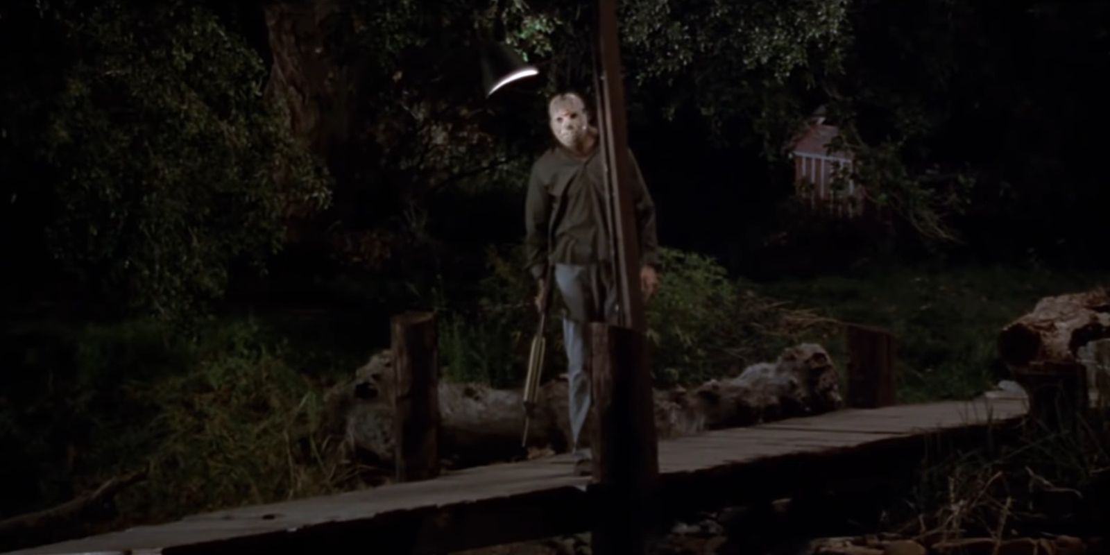 Jason holding a spear gun on the dock in Friday the 13th Part 3