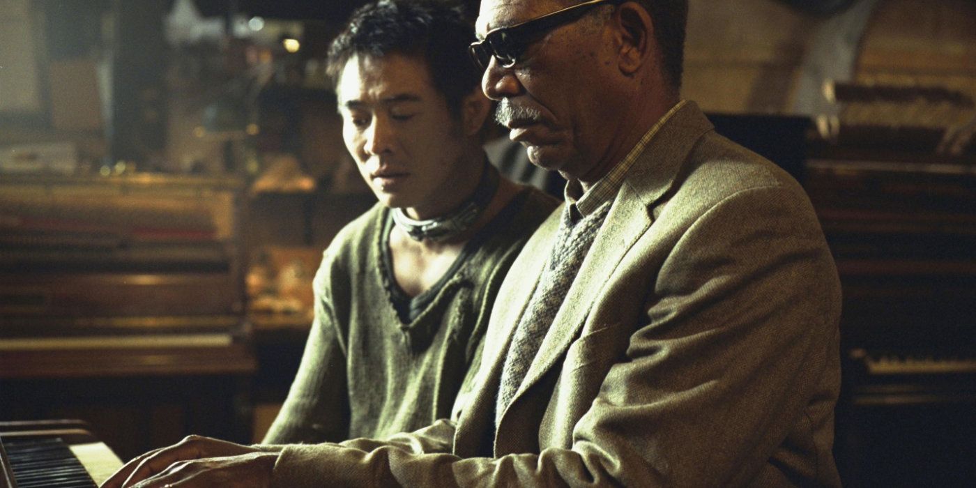 Jet Li and Morgan Freeman at a piano in Unleashed