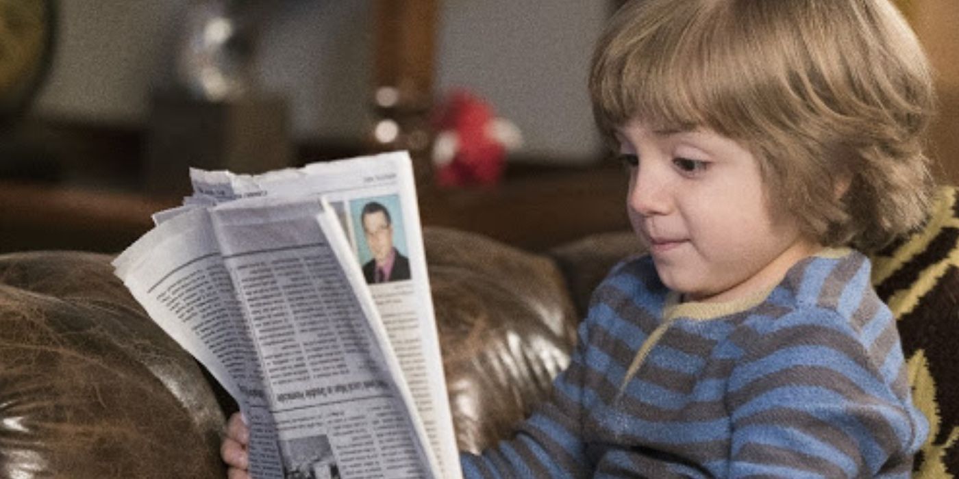 Joe pritchett reading the newspaper in modern family